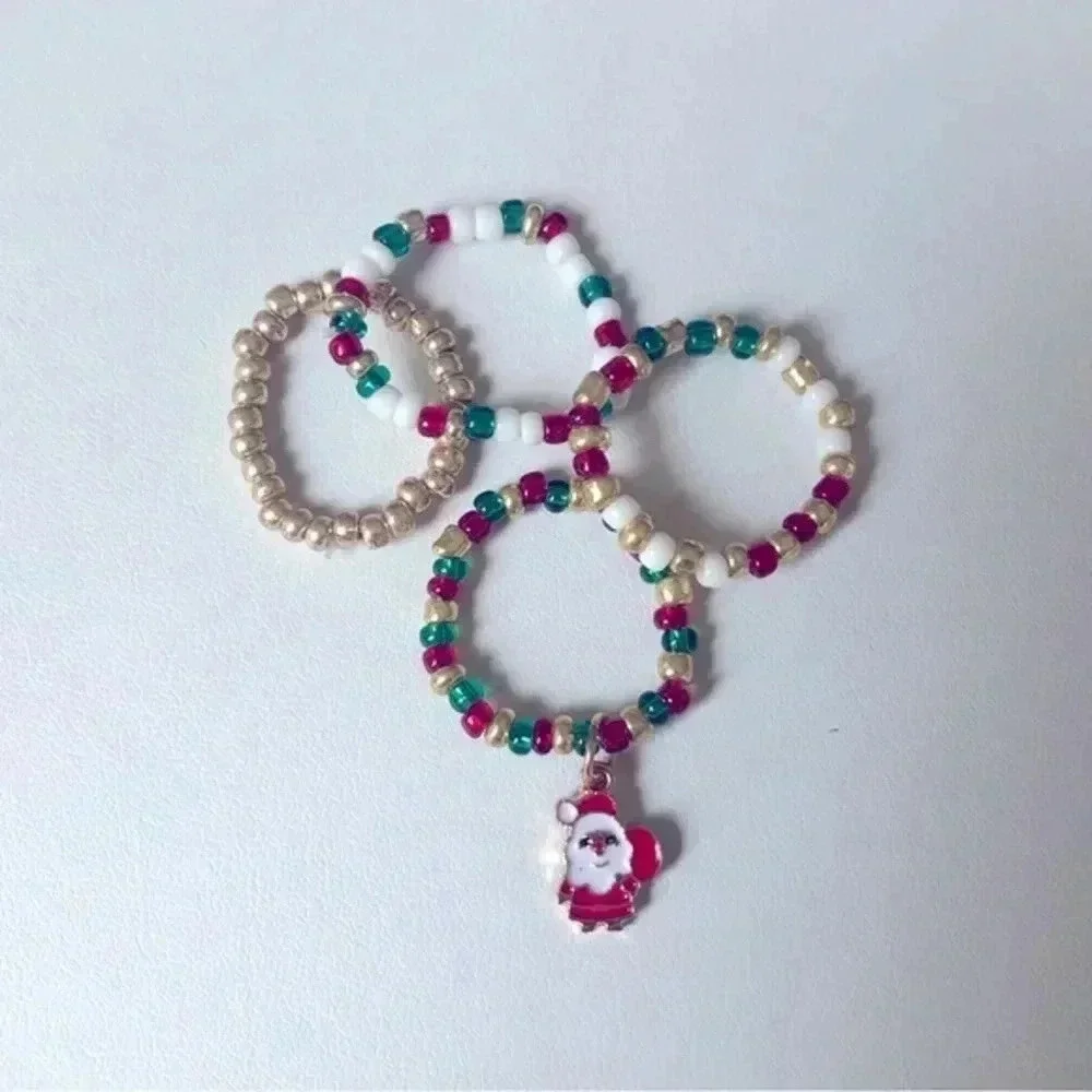 4 Piece Pack Santa Christmas Handmade Stretch Rings-  Red, Gold, White, Green